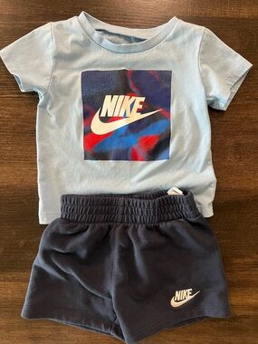 Nike Kids Two-Piece Tee and Shorts Set in Light Blue and Navy with Graphic Logo